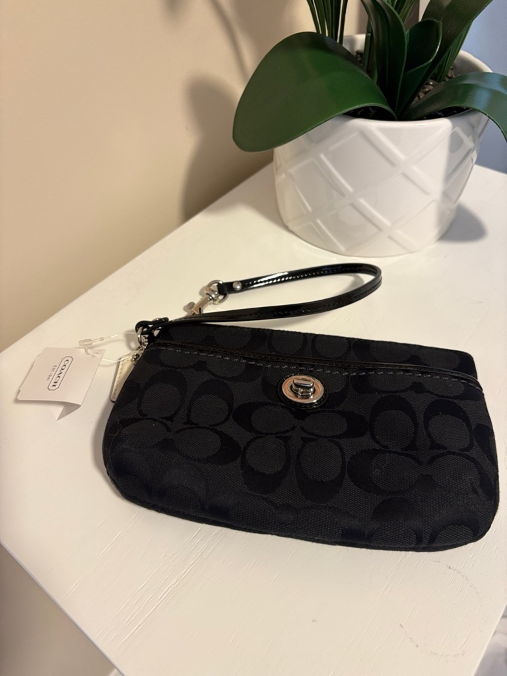 Coach Black Signature Turnlock Wristlet